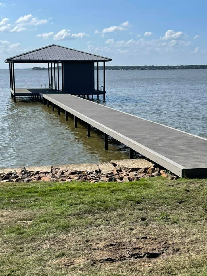 Covered deck with long walk way on the water