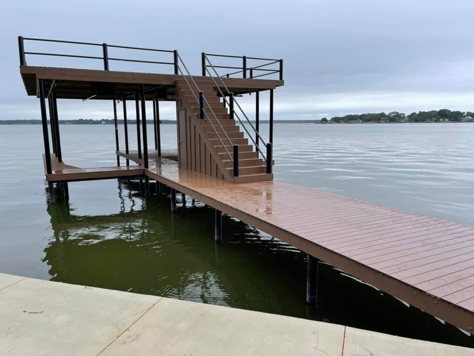 Dock pictured on the water with stairs in a brown color