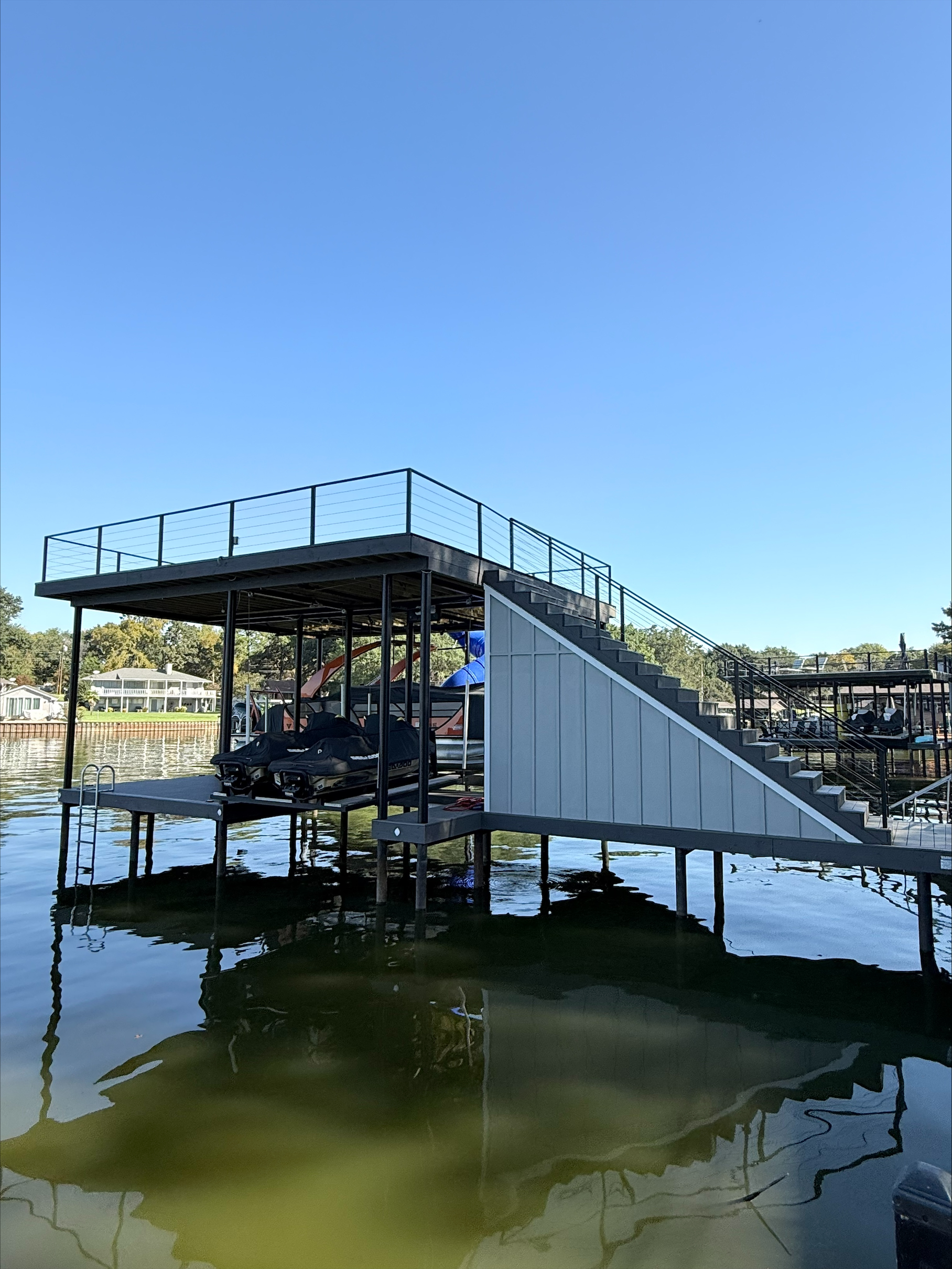 Custom Lakefront Dock with Covered Boat Slip near Cedar Creek Lake, Texas